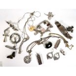 A group of silver and metalware jewellery including brooches, ingot pendants, an identity