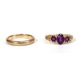 A 9ct yellow gold wedding band, ring size M and a 9ct dress ring set purple stones, overall 5.4
