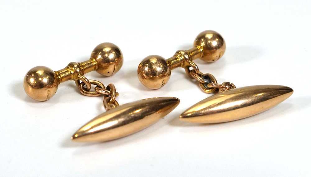 A pair of 15ct yellow gold torpedo/dumbell cufflink's, overall 4.8 gms (2)