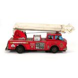 A Japanese tinplate battery operated emergency fire truck, l. 38 cmWorking order unknown. Typical