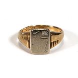 A 9ct yellow gold and white metal highlighted signet ring set small diamond in a recessed setting,
