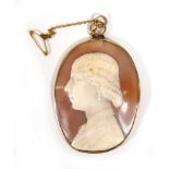 A late 19th/early 20th century yellow metal mounted cameo depicting a head and shoulders portrait of
