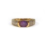 A 9ct yellow gold ring set oval amethyst and small diamonds,ring size L,3.1 gms