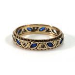 A 9ct yellow gold eternity ring set marquise shaped sapphires and paste,ring size W,3.8 gms (af)Well