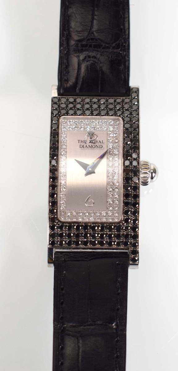 An 18ct white gold Prestige wristwatch by The Royal Diamond, the rectangular dial within a white and