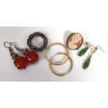 A pair of yellow metal hoop earrings, 4.1 gms, a pair of green hardstone ear pendants, two silver