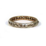 A yellow and white metal highlighted full eternity ring set small old cut diamonds,ring size L,2.1