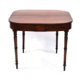 An early 19th century mahogany folding tea table, the frieze with marquetry banding, on turned