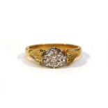 An 18ct yellow gold ring set small diamond in an illusion setting,ring size L,4.3 gms