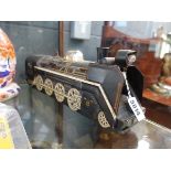 A Japanese Modern Toys battery operated tinplate steam train, l. 38.5 cmWorking order unknown.