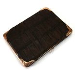 An Edwardian 9ct yellow gold mounted simulated crocodile skin wallet, Henry Marshall & Sons,