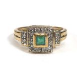 A 9ct yellow gold ring set square cut emerald within a stepped diamond border,ring size P,3.5 gms