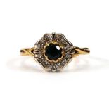 An 18ct yellow gold cluster ring set small sapphire and diamonds within a clover shaped mount,ring
