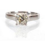 A platinum ring set old cushion cut diamond in a four claw setting,stone approx. 1.33 carats,