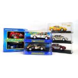 Six Scalextric racing cars including Lancia Deltas, a two car raving pack and others, all boxed,