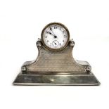 An early 20th century silver engine turned mantle timepiece of architectural form, Harrison &