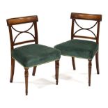 A pair of Regency mahogany occasional chairs on turned tapering front legs, the back splats with