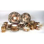 A group of Royal Crown Derby, Royal Albert and other Imari pattern tableware including side
