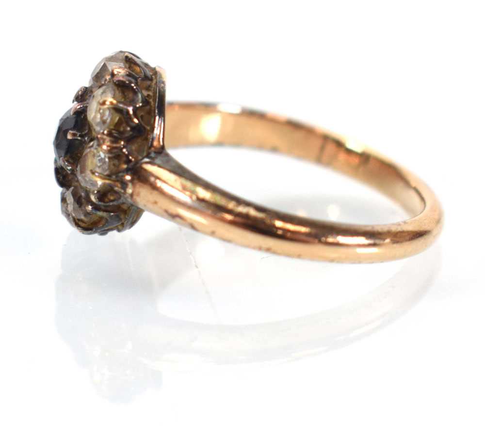 An early 20th century 15ct yellow gold cluster ring set round cut sapphire within a border of - Image 2 of 4