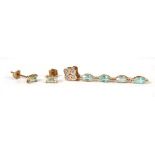 A 9ct yellow gold pendant set paraiba tourmaline and small diamonds and a pair of matching ear