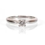 An 18ct white gold ring set brilliant cut diamond in an illusion setting, ring size O 1/2, 3.1 gms