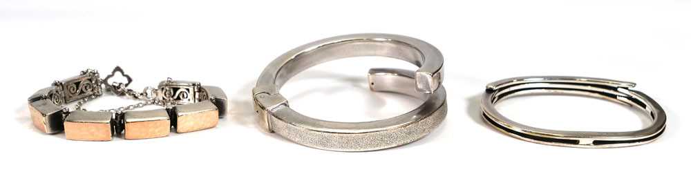 A silver hinged bracelet by Pianegonda and two further modernist silver bracelets (3)