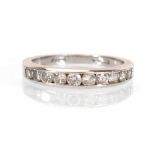 An 18ct white gold half eternity ring set ten graduated brilliant cut diamonds,ring size L,2.9 gms