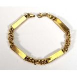 An 18ct yellow gold curb and bar link bracelet with lobster clasp, l. 20 cm, 11.3 gms