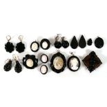 A mixed group of jet and jet-type jewellery including cameo earrings and pendants, ear pendants
