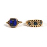 An 18ct yellow gold ring set three graduated sapphires interspersed with four small diamonds, ring