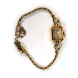 An early 20th century ladies 14ct yellow gold wristwatch by Rolex, the square silvered dial with dot