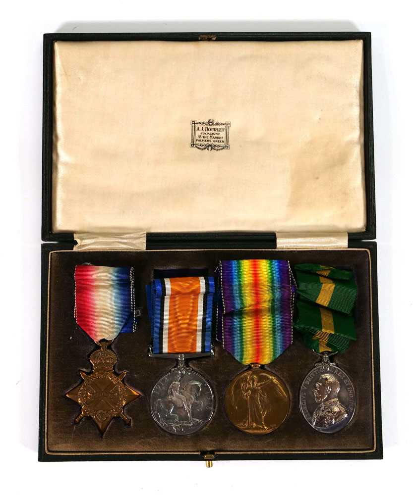 A cased set of four First World War medals awarded to 630 Corporal C W Inman RFA/RA including a