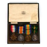 A cased set of four First World War medals awarded to 630 Corporal C W Inman RFA/RA including a