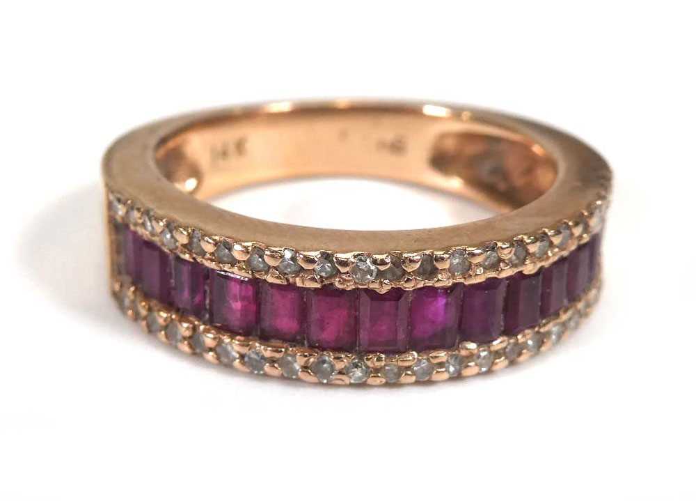 A 14ct rose gold half eternity ring set baguette cut rubies and small diamonds,ring size N 1/2,4.9