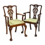 A pair of Edwardian mahogany carver armchairs in the Chippendale style
