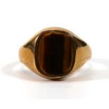 A 9ct yellow gold signet ring set tigers eye,ring size U,4.2 gms