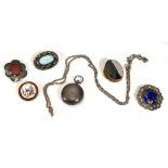 A silver sovereign case, a silver necklace, four costume brooches and an agate pill box (7)