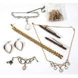 A small group of jewellery comprising two moonstone necklaces, a clear glass necklace, two micro