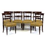 A set of six Victorian mahogany bar back dining chairs on reeded tapering legs