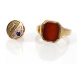 A 9ct yellow gold signet ring set red hardstone, ring size R, together with a yellow metal tin