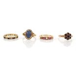 Four 9ct yellow gold and yellow metal dress rings set garnet, seed pearls etc., various sizes,