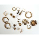 A group of 9ct yellow gold jewellery comprising ear studs, ear hoops. pendants etc., overall 15.3