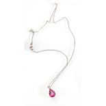 An 18ct white gold chainlink necklace suspending a pendant set teardrop pink topaz, overall 3.4 gms