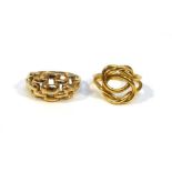 A 9ct yellow gold bricklink ring and a similar yellow metal knot ring, various sizes, overall 6