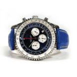 A gentleman's stainless steel Navitimer World GMT wristwatch by Breitling, the blue dial with