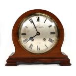A 20th century mantel clock retailed by HL Brown & Son of London & Sheffield, the Empire movement