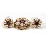 A 9ct yellow gold brooch set oval amethyst within a border of six cultured pearls, w. 2.2 cm,