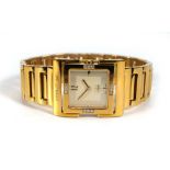 A ladies gold plated wristwatch by Cerruti, the square dial with baton numerals within a diamond set