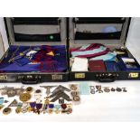 Masonic Regalia: two cases containing aprons, booklets, playing cards etc. together with seven