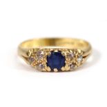 An 18ct yellow gold ring set sapphire and six old cut diamonds,ring size L,3.5 gmsWell worn